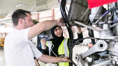 Engineer Shaikha Al Remaithi about to replace a seal on an Etihad aircraft at Etihad Airways Engineering's facilities in Abu Dhabi Reem Mohammed/The National