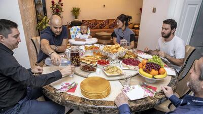 Iftar with the Afaunov family. Antonie Robertson / The National