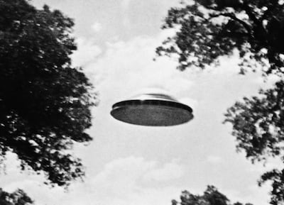 A photo taken by a member of the Amalgamated Flying Saucer Clubs of America allegedly showing a UFO. Photo: Bettmann Archive