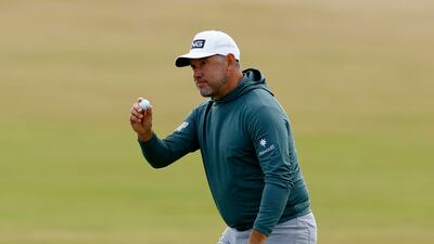 England's Lee Westwood reacts after making par on the first. He finished with a four under par 68. Reuters