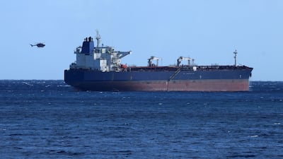 Russian shadow fleet oil tanker DF Peak is escorted by the French Navy towards La Possession Bay, off the coast of the French Indian Ocean island of La Reunion, on October 15. AFP
