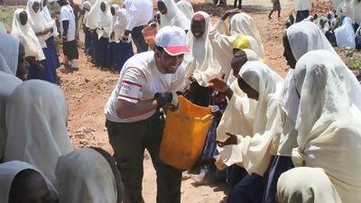 Provided photos of volunteers with the Takatof Foundation and Sanid, the UAE emergency volunteers programme, building classrooms with the community of Matamwe and the students at Mfurumatonga School. Courtesy Takatof