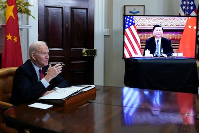 US President Joe Biden holds a virtual meeting with Chinese President Xi Jinping in April 2022. AP