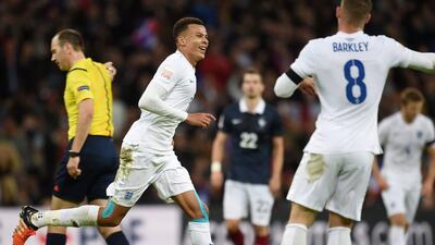 England’s Deli Alli celebrates after scoring against France. Andy Rain / EPA