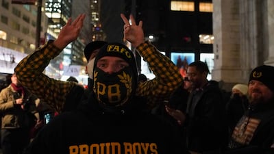 Mr Biden spoke about extremists in America. Shown here is a member of the 'Proud Boys' neo-fascist group. Reuters