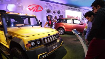India has a population of more than 1.2 billion, but only 12 out of every 1,000 own a car, according to the World Bank. Above, a scene from the Auto Expo 2014 outside New Delhi. Kuni Takahashi / Bloomberg