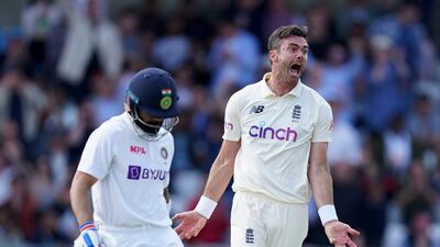 England's James Anderson, right, celebrates the dismissal of Virat Kohli. AP