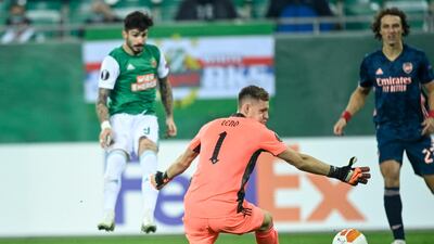 Taxiarchis Fountas finishes past Arsenal goalkeeper Bernd Leno to give Rapid Vienna the lead. EPA