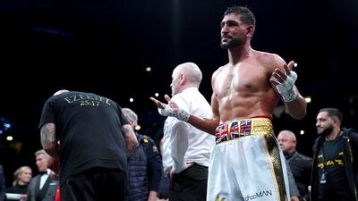 Amir Khan reacts after losing. AP