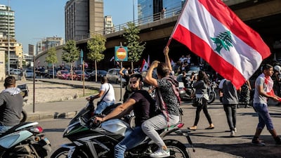 Lebanese students from various universities shout slogans during ongoing anti-government protests as they march from Lebanese University toward Riad Solh square in front the government palace in Beirut. EPA