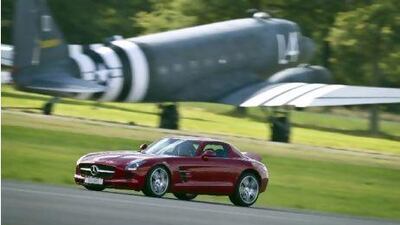 David Coulthard laps the Dunsfold Aerodrome in a Mercedes-Benz SLS AMG