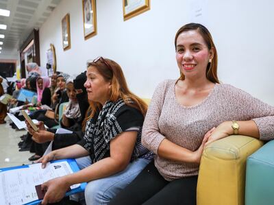 Catherine Busbus from the Philippines was at the Tasheel centre looking to get a six-month visa. Victor Besa / The National