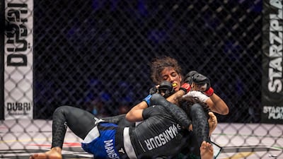 Zamzam Al Hammadi featured in a women’s strawweight amateur showcase against Abeer Mansour and earned a hard-fought decision.
