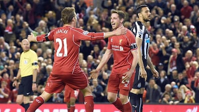 Liverpool's Welsh midfielder Joe Allen, right. AFP