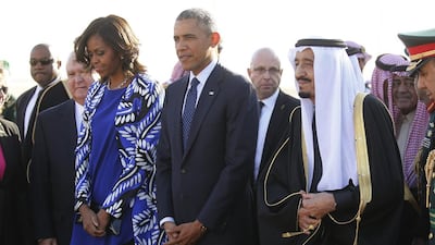 US president Barack Obama and first lady Michelle Obama are greeted by Saudi Arabia's King Salman as they arrive at King Khalid International Airport in Riyadh on January 27. Jim Bourg / Reuters