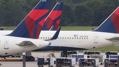 Delta Air Lines delayed or cancelled thousands of flights this month, which will hit second-quarter profit, it said. Red Huber / Orlando Sentinel