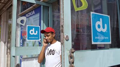 The churn rate, or the percentage of customers that jump from one operator to another, for both operators in the UAE stands at 32 per cent every year. Philip Cheung / The National