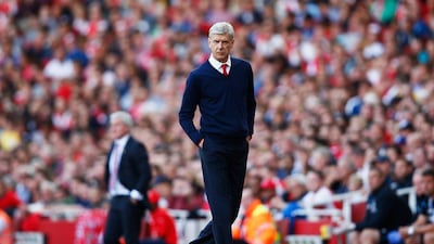 Arsenal manager Arsene Wenger shown at the touchline of his side's Premier League match against Stoke City last Saturday. Clive Rose / Getty Images / September 12, 2015