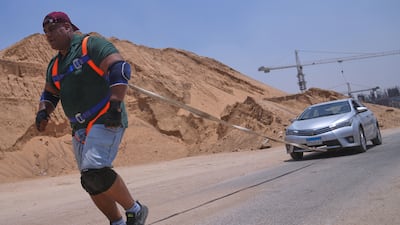 Pulling a car during a training session in Cairo