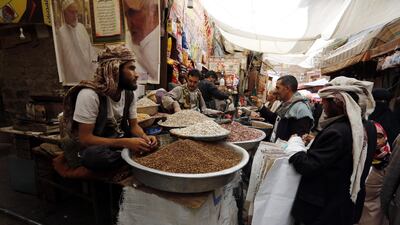 Yemenis shop for the Eid Al Fitr festival, marking the end of the Muslim fasting month of Ramadan, at a market in the old quarter of Sana'a, Yemen. EPA