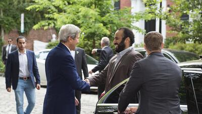 US Secretary of State John Kerry greets Saudi deputy crown Prince Mohammed bin Salman outside Kerry's residence prior to their meeting on June 13, 2016. Molly Riley / AFP Photo