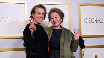 Best Actress and Best Supporting Actress: Frances McDormand for 'Nomadland' and Youn Yuh-jung for 'Minari' respectively, pose in the press room at the Oscars on Sunday, April 25, 2021, at Union Station in Los Angeles. AFP