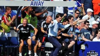 Michael Laudrup, centre, enjoyed a winning to start to life in the English Premier League as his Swansea City side thumped Queens Park Rangers 5-0 at Loftus Road. Daniel Hambury / AP Photo