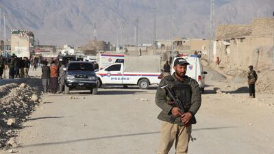 A Pakistani security official stands guard after a bomb blast in Quetta, Pakistan. EPA