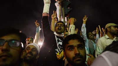 Supporters of cricketer-turned-politician Imran Khan and Canadian cleric Tahir Ul Qadri gather near the prime minister’s residence in Islamabad on August 31, 2014. Mr Khan vowed on August 31 to protest ‘until the last breath’. Farooq Naeem/AFP Photo
