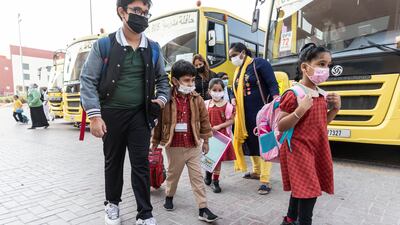 Pupils arrive for the first day of the new term at the Delhi Private School.