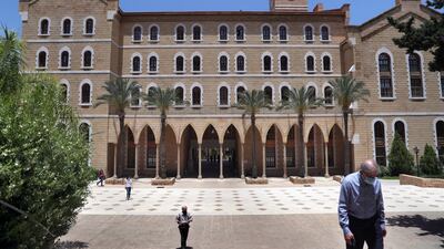 People walk on American University of Beirut's campus (AUB,) one of the oldest and most prestigious education institutions in the Middle East. AP