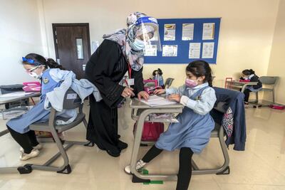 Strict safety measures are being followed for those returning to classrooms. Antonie Robertson / The National