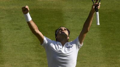 Switzerland's Roger Federer celebrates winning his match against Croatia's Marin Cilic in the Wimbledon quarter-final on Wednesday. Tony O'Brien / Reuters