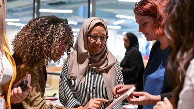 Makki, centre, with students and staff from Sorbonne University Abu Dhabi.