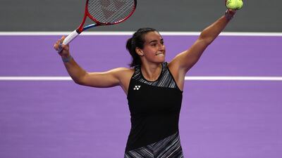 Caroline Garcia celebrates her win over Daria Kasatkina at the WTA Finals by hitting balls into the crowd. Getty