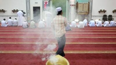 Oudh is burnt before evening prayers to create a fragrant aroma in the Sheikh Zayed Mosque in Ajman.