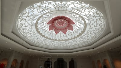 Striking ceiling decorations above the area where idols will be placed in the Hindu temple in Jebel Ali, Dubai. All photos: Pawan Singh / The National