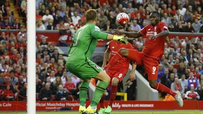 Christian Benteke scores the first goal for Liverpool and the Reds hold on for a 1-0 win over unlucky Bournemouth at Anfield. Carl Recine / Reuters