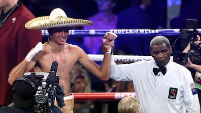 Sebastian Fundora (left) celebrates defeating Daniel Lewis on points in the super welter weight bout at the MGM Grand, Las Vegas. PA wire
