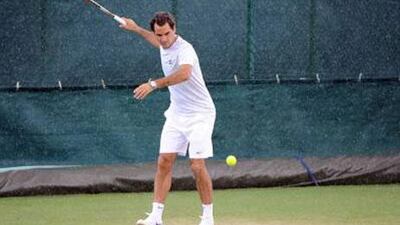 No competition on the court did not mean Roger Federer was going to stay away from hitting balls on Sunday.