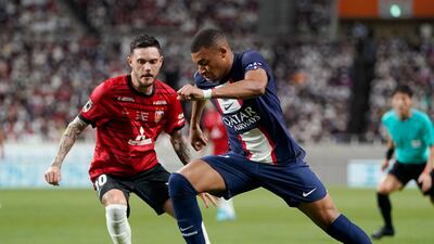 Paris Saint-Germain's Kylian Mbappe (R) on his way to score. EPA