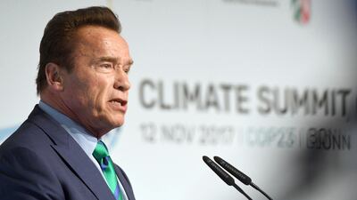 Former governor of California Arnold Schwarzenegger talks during the World Climate Conference in Bonn, Germany, on November 12, 2017. He says more can be done to counter US president Donald Trump’s 'stone age' actions. Henning Kaiser / dpa via AP