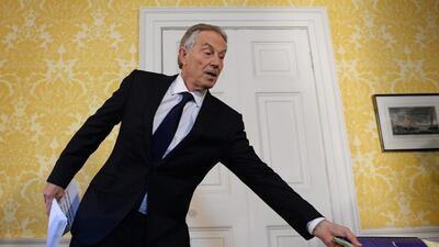 Tony Blair with a copy of the Chilcot report. The chilling effect of his actions in Iraq will affect western policymakers for many years. (Photo by Stefan Rousseau - WPA Pool/Getty Images)