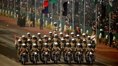 BSF stunt riders take part in the parade in New Delhi. Money Sharma / AFP