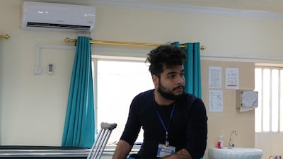 Seif Salman awaits a physiotherapist for treatment ahead of having a prosthetic leg fitted. Ameer Hazim for The National