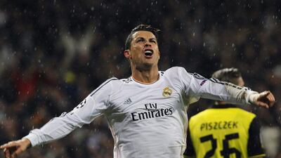 Cristiano Ronaldo celebrates after scoring Real Madrid's third goal on Wednesday against Borussia Dortmund. Kiko Huesca / EPA / April 2, 2014