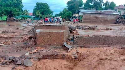 Torrential rain triggered the flash floods, which struck early on Sunday morning as residents of the mostly Catholic island prepared to celebrate Easter. AP