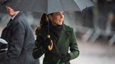 Catherine, Duchess of Cambridge carries a Manu Atelier bag as she visits Blackpool Tower in March. EPA