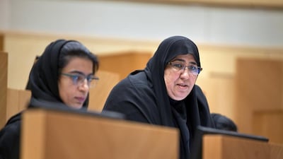 Sharjah FNC member Aisha al Yammahi, right, is an outspoken contributor to debate on education policy. Silvia Razgova / The National
