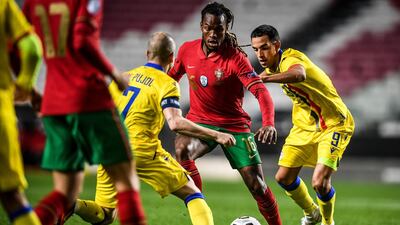 Renato Sanches vies with Marc Pujol (L) and Aaron Sanchez. AFP